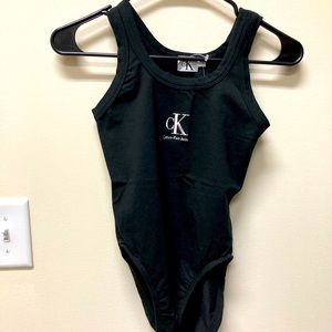 Brand new Calvin Klein body. Small size, black with white stitching.